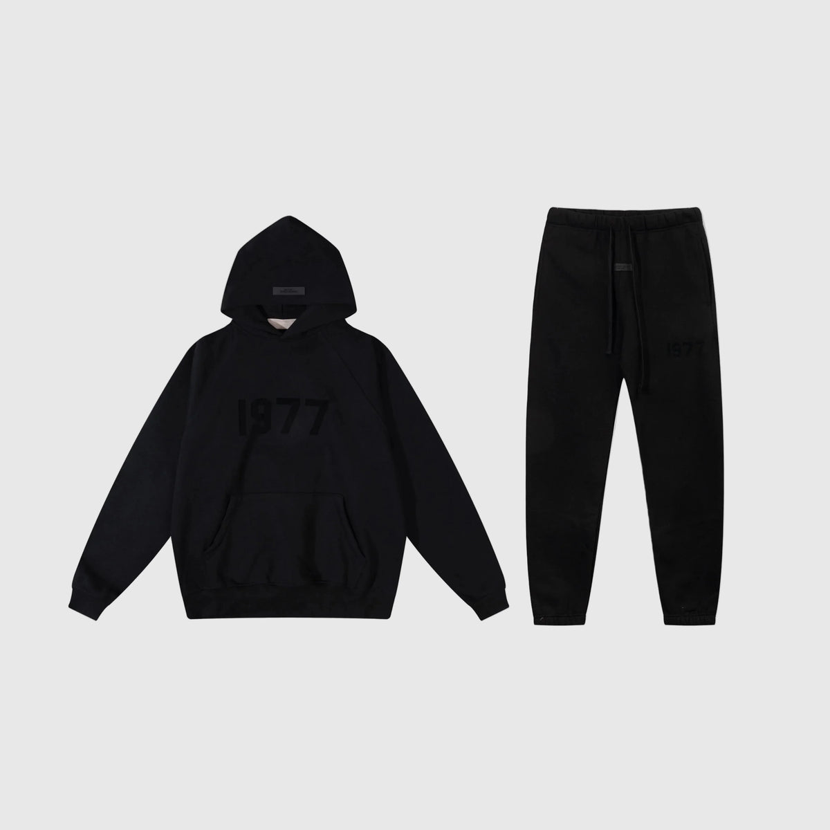 Fear of God Essentials Black Tracksuit – Rubber Logo Hoodie & Jogger Set