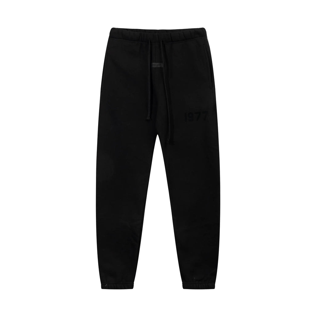 Fear of God Essentials Black Tracksuit – Rubber Logo Hoodie & Jogger Set